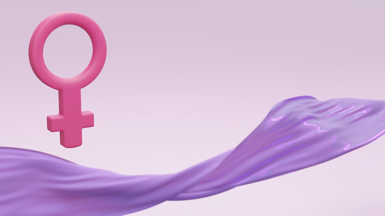 Pink female gender symbol with elegant purple fabric on a pastel background.